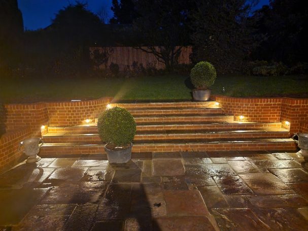 Staircase lighting leading to back garden.