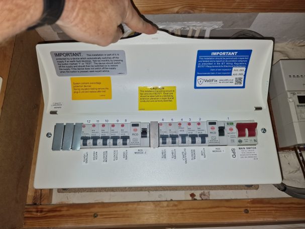 Single‑phase RCD split consumer unit with SPD, fully labelled and professionally tested.